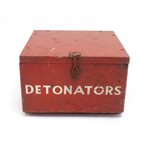 1311 - A 20thC industrial case, of plywood construction with red painted finish, the fall front marked 'Det... 