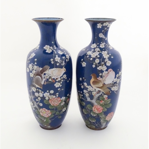 1314 - Two large Oriental cloisonne vases decorated with peony flowers, blossom and two doves / birds perch... 