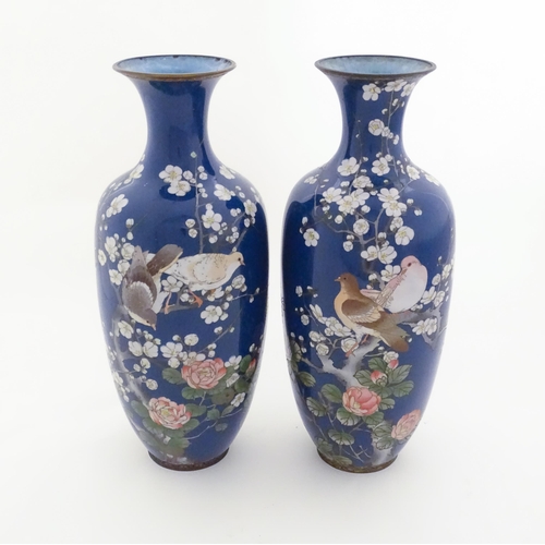 1314 - Two large Oriental cloisonne vases decorated with peony flowers, blossom and two doves / birds perch... 