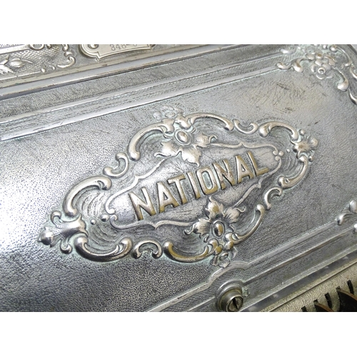 1316 - An early 20thC American cash register with floral and foliate decoration, by the National Cash Regis... 