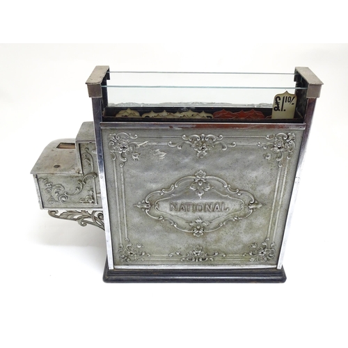 1316 - An early 20thC American cash register with floral and foliate decoration, by the National Cash Regis... 