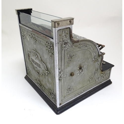 1316 - An early 20thC American cash register with floral and foliate decoration, by the National Cash Regis... 