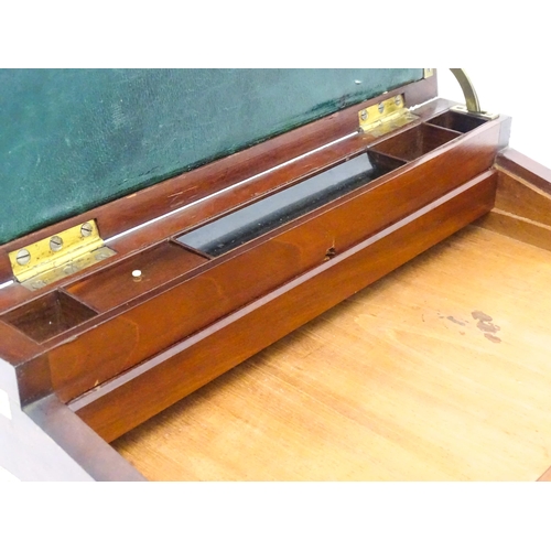 1318 - A 19thC mahogany brass bound writing box / slope with campaign style handles, drawer to side and thr... 