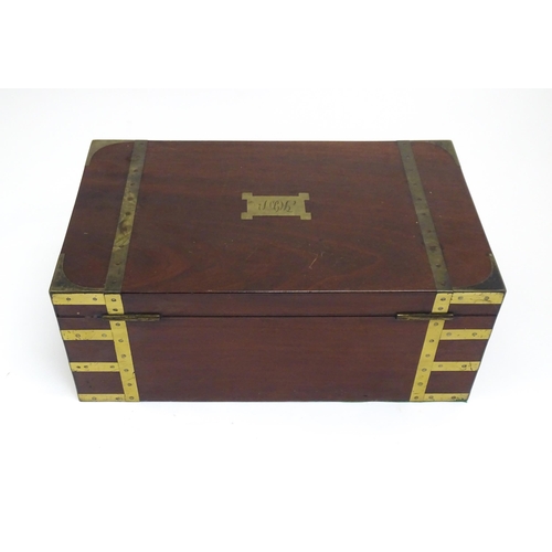 1318 - A 19thC mahogany brass bound writing box / slope with campaign style handles, drawer to side and thr... 