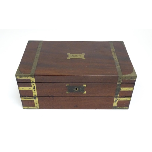 1318 - A 19thC mahogany brass bound writing box / slope with campaign style handles, drawer to side and thr... 