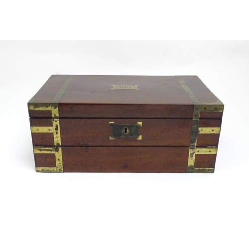 1318 - A 19thC mahogany brass bound writing box / slope with campaign style handles, drawer to side and thr... 