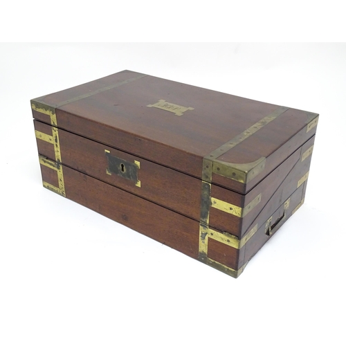 1318 - A 19thC mahogany brass bound writing box / slope with campaign style handles, drawer to side and thr... 