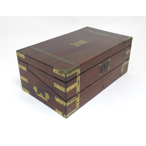 1318 - A 19thC mahogany brass bound writing box / slope with campaign style handles, drawer to side and thr... 