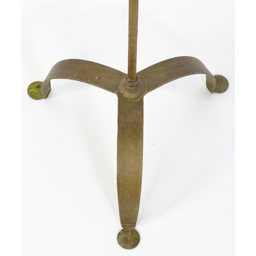 1320 - An unusual late 20thC gilt metal stand with a triform base supporting a perpetual motion / counter b... 