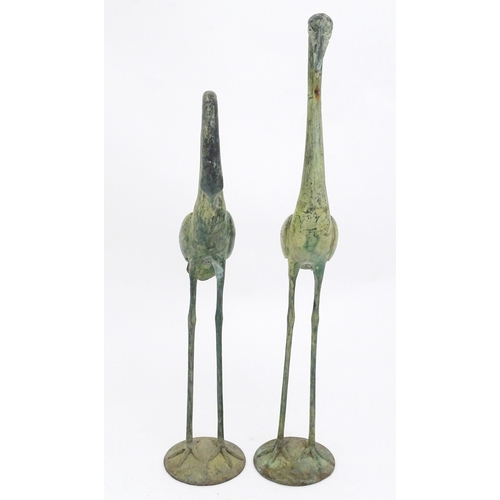 1327 - Two late 20thC cast models of crane / heron birds. Largest approx. 24