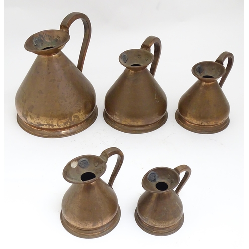 1328 - Five graduated copper haystack / harvest measures / jugs with loop handles with pewter seals / touch... 