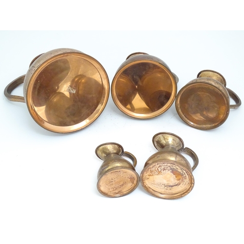 1328 - Five graduated copper haystack / harvest measures / jugs with loop handles with pewter seals / touch... 