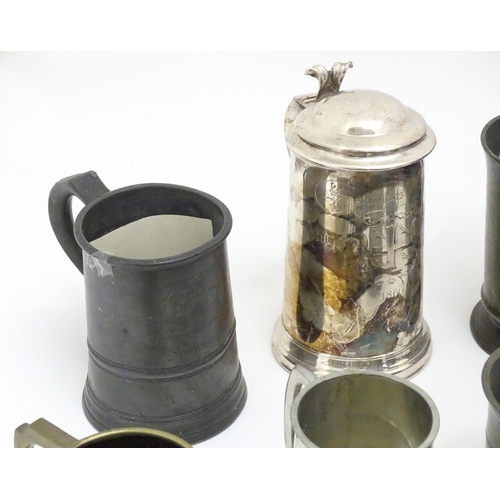 1331 - A quantity of 19thC and later pewter tankards, including examples by James Dixon & Sons, several wit... 