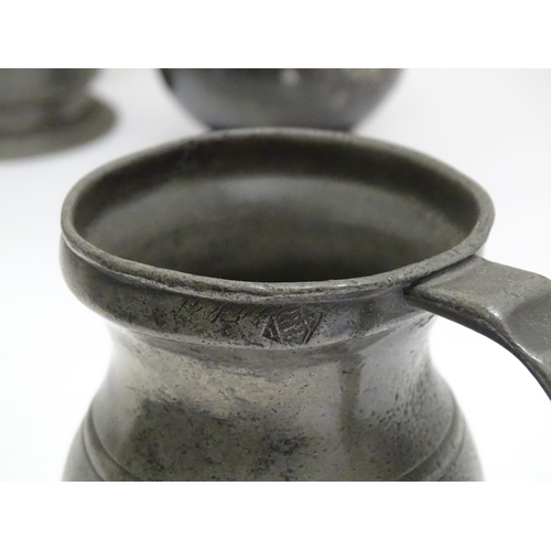 1331 - A quantity of 19thC and later pewter tankards, including examples by James Dixon & Sons, several wit... 