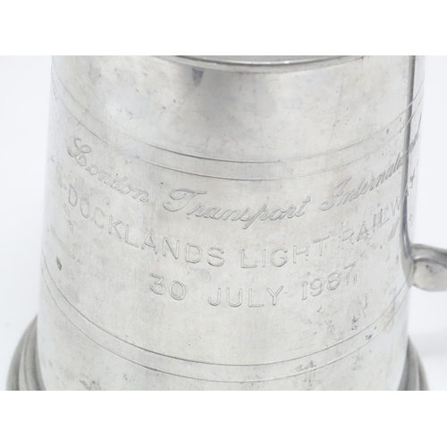 1331 - A quantity of 19thC and later pewter tankards, including examples by James Dixon & Sons, several wit... 