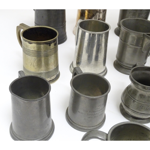 1331 - A quantity of 19thC and later pewter tankards, including examples by James Dixon & Sons, several wit... 