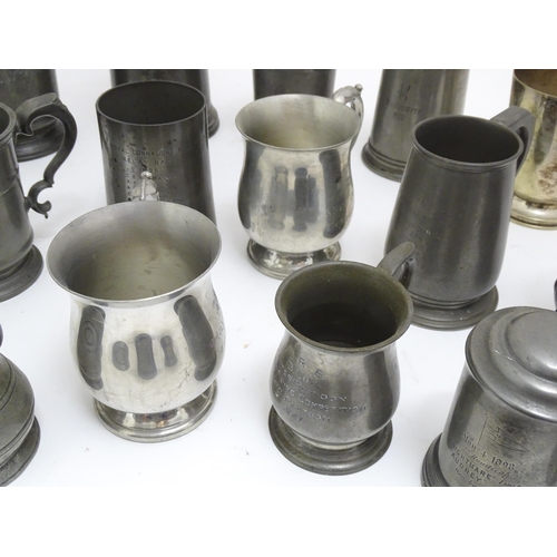 1331 - A quantity of 19thC and later pewter tankards, including examples by James Dixon & Sons, several wit... 