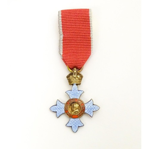 859 - A miniature George VI Commander of the British Empire / CBE medal , with enamelled finish and cipher... 