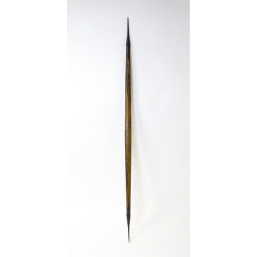 868 - Arms / Armour : A longbow or section of a crossbow of carved form with applied iron tapering mounts ... 