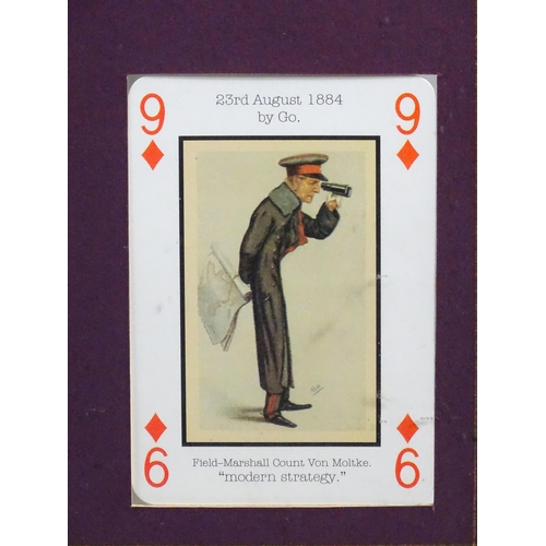 874 - Militaria: a framed group of four Vanity Fair military playing cards , each with cartoon depictions ... 