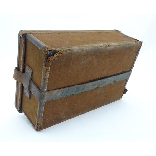 1171 - A late Victorian shotgun cartridge magazine, constructed from leather and canvas covered hardwood, t... 