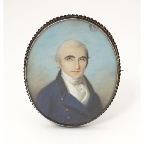 1265 - An 18thC English School oval watercolour and bodycolour portrait miniature depicting a gentleman wea... 