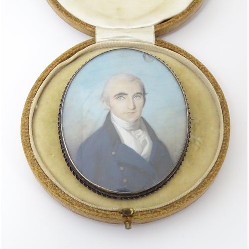 1265 - An 18thC English School oval watercolour and bodycolour portrait miniature depicting a gentleman wea... 