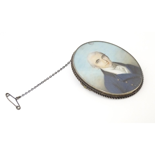 1265 - An 18thC English School oval watercolour and bodycolour portrait miniature depicting a gentleman wea... 