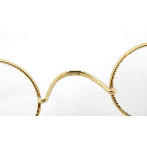 1280 - 19thC gilt metal spectacles / glasses, the bridge of one stamped Hadley. Approx. 4 1/2