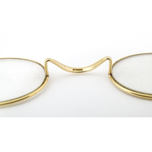 1280 - 19thC gilt metal spectacles / glasses, the bridge of one stamped Hadley. Approx. 4 1/2