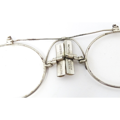 1281 - Assorted 19thC and later spectacles, to include a faux tortoiseshell shell example, pince nez, etc. ... 