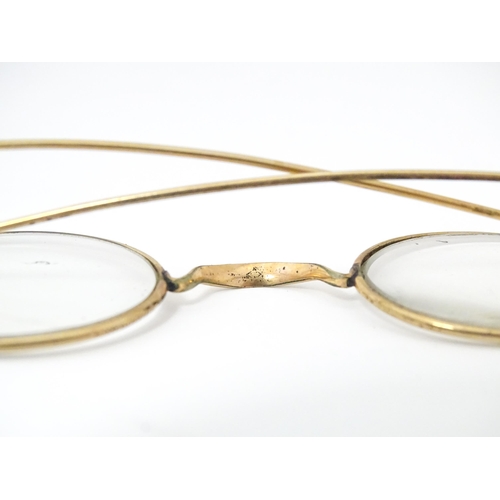 1281 - Assorted 19thC and later spectacles, to include a faux tortoiseshell shell example, pince nez, etc. ... 