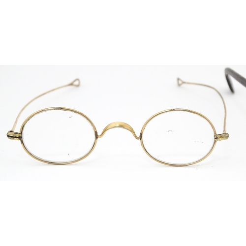 1281 - Assorted 19thC and later spectacles, to include a faux tortoiseshell shell example, pince nez, etc. ... 