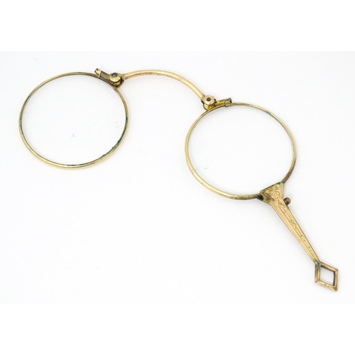 1283 - Late 19th / early 20thC gilt metal folding lorgnette spectacles, with leather slip case. Approx. 3 1... 