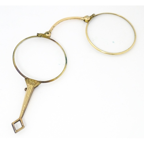 1283 - Late 19th / early 20thC gilt metal folding lorgnette spectacles, with leather slip case. Approx. 3 1... 