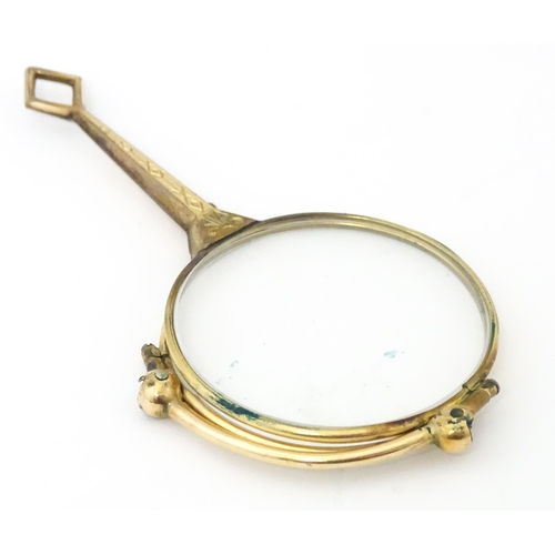 1283 - Late 19th / early 20thC gilt metal folding lorgnette spectacles, with leather slip case. Approx. 3 1... 