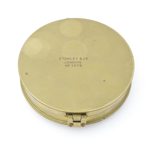 1284 - A 20thC brass cased surveyor's compass by Stanley & Co. of London, no. 1479. Approx. 4 1/2