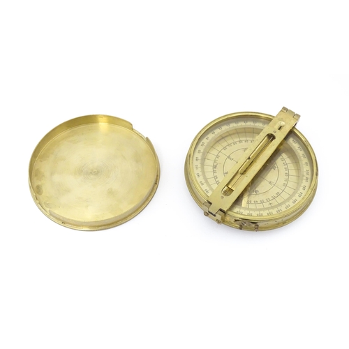 1284 - A 20thC brass cased surveyor's compass by Stanley & Co. of London, no. 1479. Approx. 4 1/2