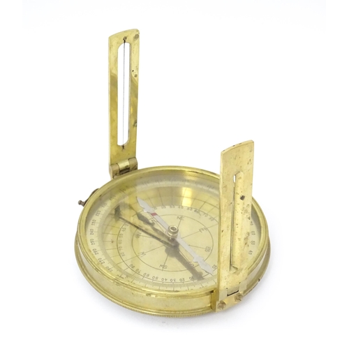 1284 - A 20thC brass cased surveyor's compass by Stanley & Co. of London, no. 1479. Approx. 4 1/2