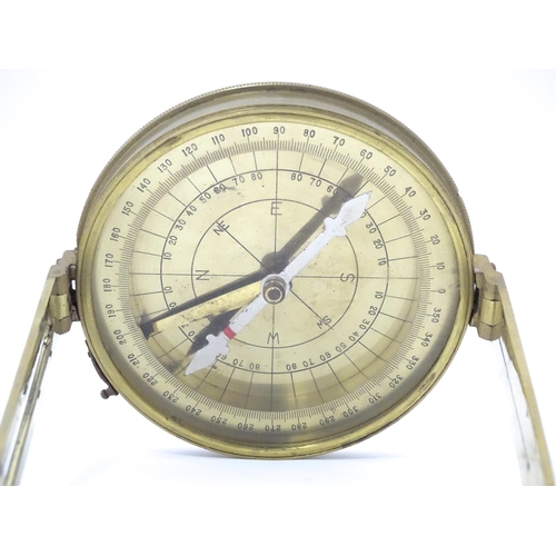 1284 - A 20thC brass cased surveyor's compass by Stanley & Co. of London, no. 1479. Approx. 4 1/2