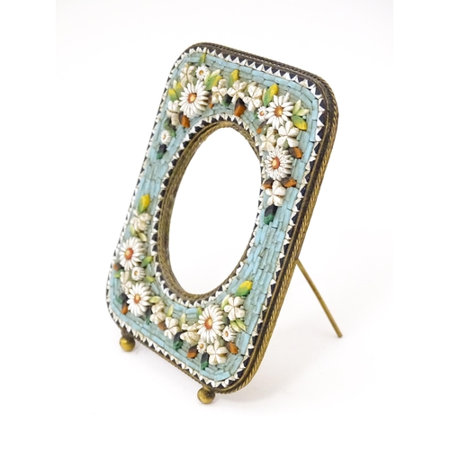 1289 - An early 20thC Italian photograph frame with floral micro mosaic surround. Approx. 3 1/4