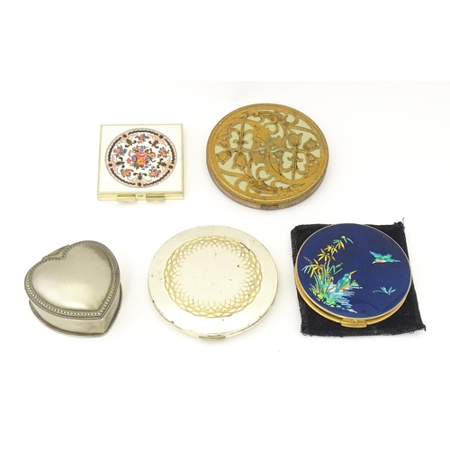 1296 - Three powder compact to include a Stratton example. Together with a folding pocket mirror, and a rin... 