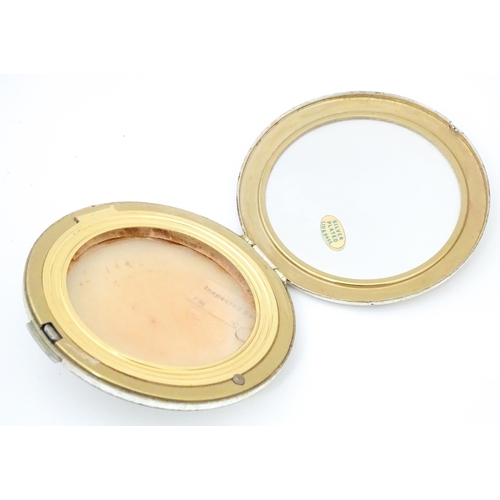 1296 - Three powder compact to include a Stratton example. Together with a folding pocket mirror, and a rin... 