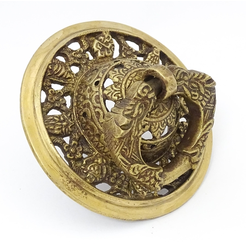 1302 - A 20thC cast gilt metal door knocker with floral and foliate detail. Approx. 5