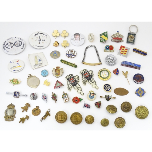 1303 - A quantity of pin badges, buttons etc. Including Royal Cambridgeshire Regiment, Royal Artillery, Roy... 