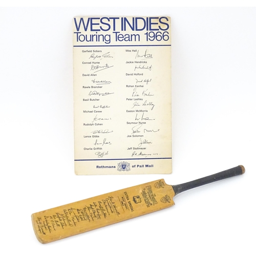 1305 - Cricket Interest: A 20thC Gray Nicolls miniature cricket bat titled The Frank Worrell Autograph with... 