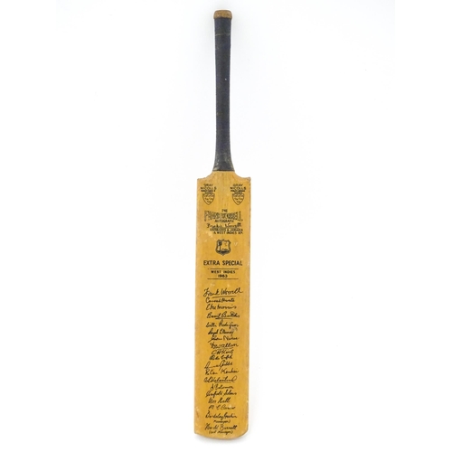 1305 - Cricket Interest: A 20thC Gray Nicolls miniature cricket bat titled The Frank Worrell Autograph with... 