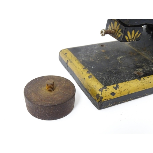 1307 - A Victorian cast iron table top desk / office paper embosser with floral decoration, by Jordan & Son... 