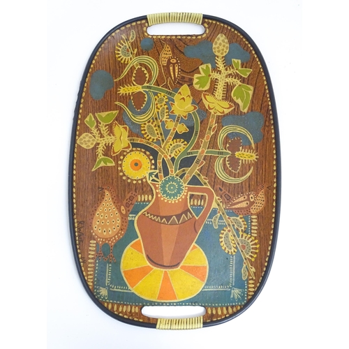 1339 - A mid century / vintage / retro tray of oval form with painted decoration depicting stylised still l... 