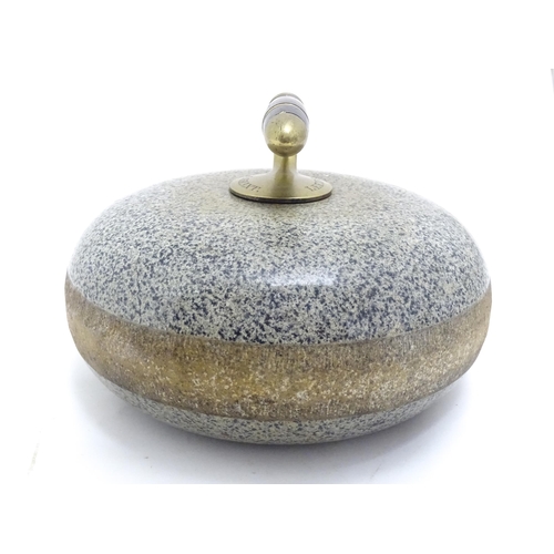 1343 - A Scottish granite curling stone with handle to centre stamped J Grant Leeds. Approx. 11